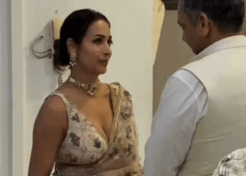 पैपराजी पर भड़कीं मलाइका अरोड़ा:किसी से बात कर रही थीं; ज्यादा करीब आने पर बोलीं- बाबा, आप इधर आ जाओ